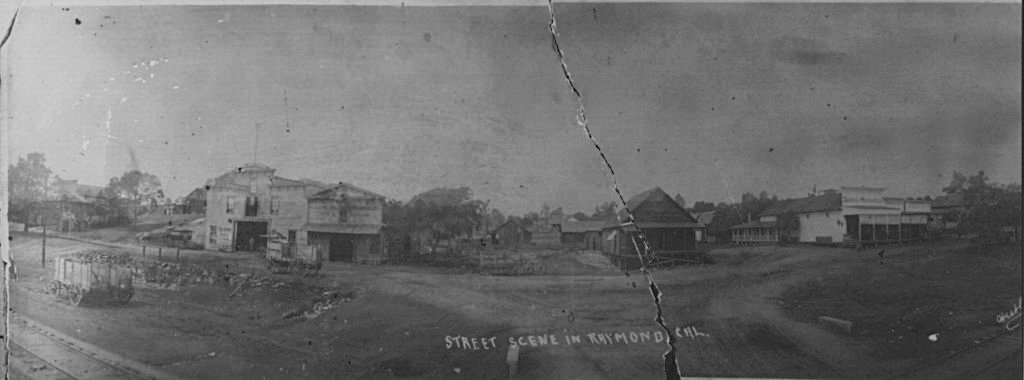 Old Picture of Raymond with general store on right