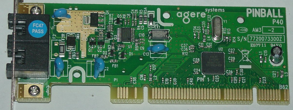 Top view of stock modem board showing chip identification